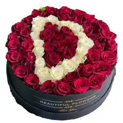 A Box Of Roses In The Shape Of A Letter
