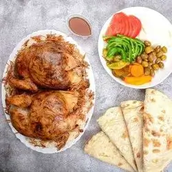 Half Chicken Stuffed With Rice 