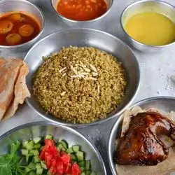 Fareeka And Chicken With Pomegranate Molasses