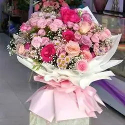 A Bouquet Of Natural Roses Of Various Colors And Types