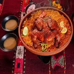 مریشکێک کە لەسەر خەڵوز کوڵاوە