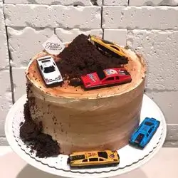 Cake with 4 children's toy cars
