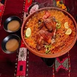 نیو مریشکێک کە لەسەر خەڵوز کوڵاوە