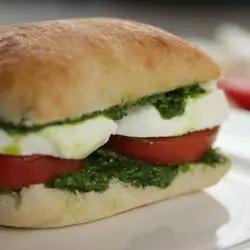 Mozzarella and pesto with tomatoes italian bread