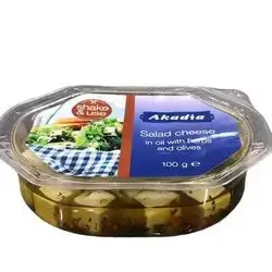 Cheese mixed with oil, herbs and olives for salad 100 g