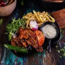 Half Stuffed Chicken On Charcoal