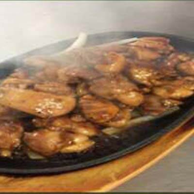 Sizzling Chicken With Onion In Soy